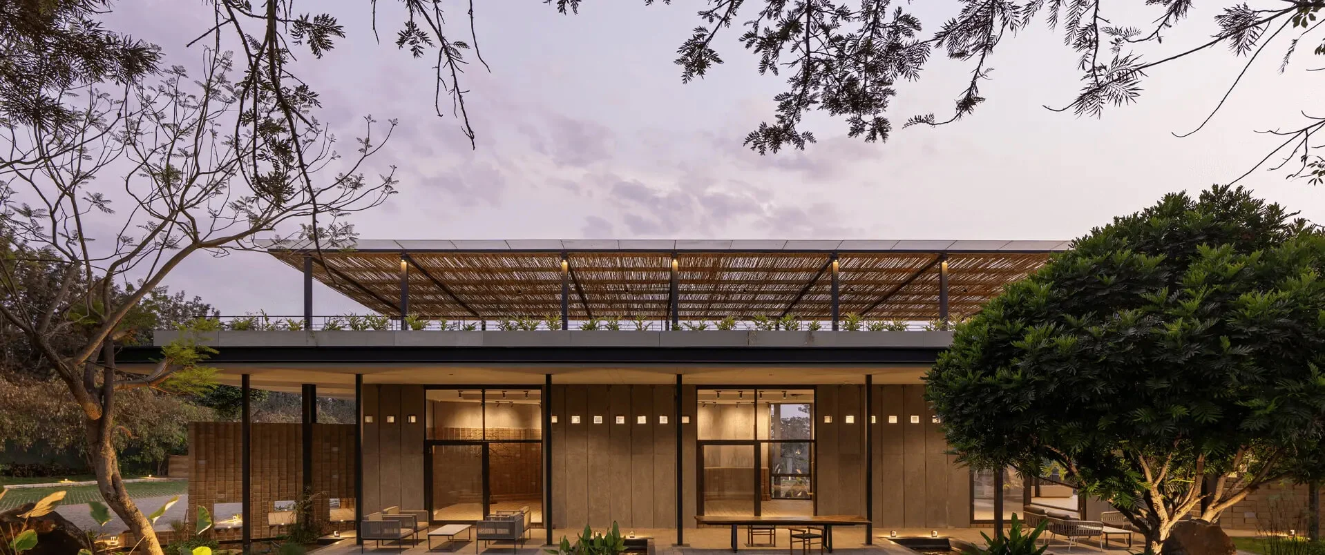 Modern luxury villa community with landscaped surroundings by Svam Realty